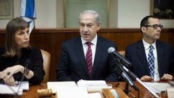 Israel's premier pledged Sunday to build a fortified fence along the frontier with Syria, warning that radical Islamist forces have taken over the area.